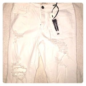 White distressed skinny cello jeans
